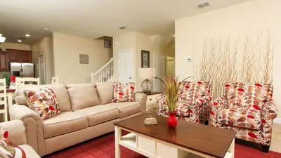 a living room with a couch and two chairs at MYR1471 in Philadelphia