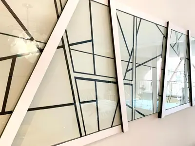 a group of glass windows on a wall at Loft Suite with private patio in Art Tower in Philadelphia