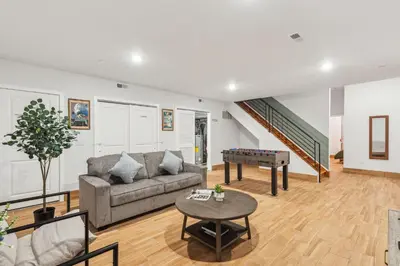 a living room with a couch and a table at Stay at Luna on 800 Callowhill in Philadelphia