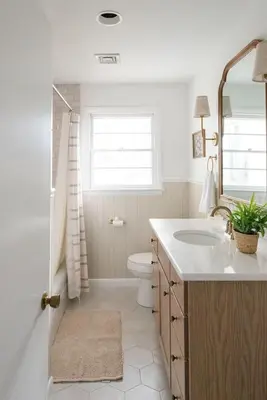 a bathroom with a sink and a toilet and a window at Wooded Cottage in Elizabethtown with hot tub and sauna in Elizabethtown