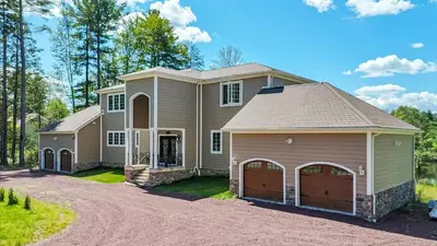 a house with a garage and a driveway at VIP Mansion Estate in Blakeslee