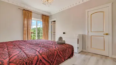a bedroom with a bed with a stuffed animal sitting on it at VIP Mansion Estate in Blakeslee