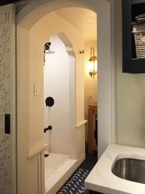 a bathroom with a sink and a tub at JC Moroccan Hideaway in Jersey City