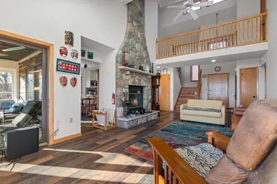a living room with a couch and a fireplace at Hidden Gem Best Views Unbeatable Seclusion etc in Albrightsville