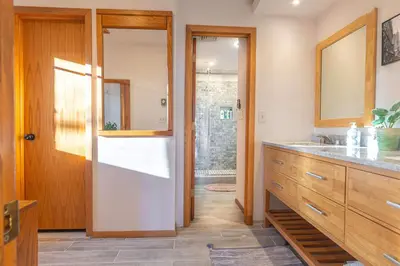 a bathroom with a sink and a mirror at Hidden Gem Best Views Unbeatable Seclusion etc in Albrightsville