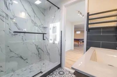 a bathroom with a sink and a glass shower at Hidden Gem Best Views Unbeatable Seclusion etc in Albrightsville