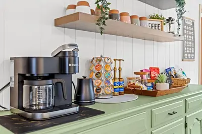 a kitchen with a coffee maker on a counter at Pocono Retreat Hot Tub MovieRoom GameRoom etc in Lake Harmony