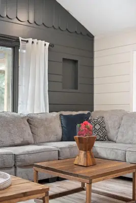 a living room with a couch and a coffee table at NewReno 8BR 6BTH DECK GAMES PETS in Lake Harmony