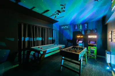 a room with a pool table and a game system at Lakefront Movie & Game Rooms Hot Tub Sauna etc in Albrightsville