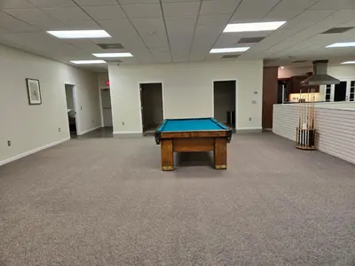 a pool table in the middle of a hall at Spooky Nook Bed and Breakfast in Manheim