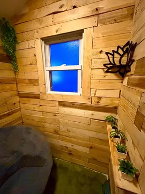 a room with a window in a log cabin at Cozy Cafe, Walk to The Mall, 30min to NYC & 5min to EWR in Elizabeth