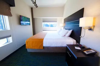 a hotel room with a bed and a desk at Warehouse Hotel at The Nook in Manheim