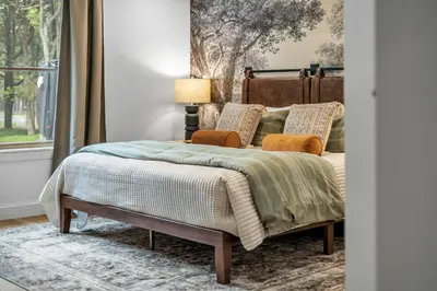 a bedroom with a bed and a window at Luxury Hot Tub Game Room and More in Albrightsville