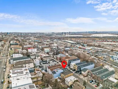 an aerial view of a city with a red stop sign at Skyline Haven Luxe NYC Escape in Jersey City