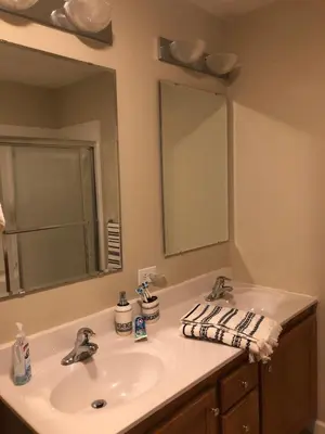 a bathroom with a sink and a mirror at Chalet in Masthope Community in Lackawaxen