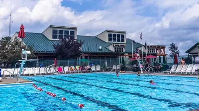 a large swimming pool in front of a resort at Chalet in Masthope Community in Lackawaxen