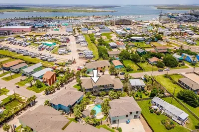 an aerial view of a resort with a parking lot at Casa Del Mar - GOLF CART INCLUDED in Philadelphia