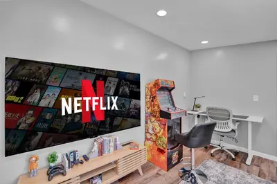 an office with a desk and a chair in a room at Palomino Ranch namaste-sunroom, hot tub, game room, king beds, fire pit, BBQ, pet-friendly in Tobyhanna