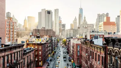 a view of a city street with buildings and cars at Chic & Modern - 35 Mins to NYC - Extended Stays in Jersey City