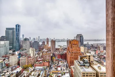 an aerial view of a city with tall buildings at Tribeca Studio w City views Gym Pool NYC-110 in New York