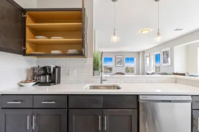 a kitchen with a sink and a counter at Downtown NWK 1BR- Free Parking Easy NYC Access in Newark