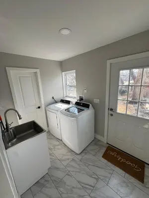 a kitchen with a sink and a dishwasher at Collingdale Home - Near Philly! in Collingdale