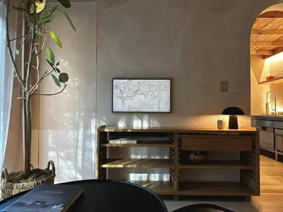 an office with a desk with a drawing on the wall at Ranch in the Woods, a Peaceful Designer Retreat in Warwick
