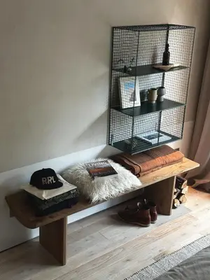 a room with a wooden bench with shoes on it at Ranch in the Woods, a Peaceful Designer Retreat in Warwick