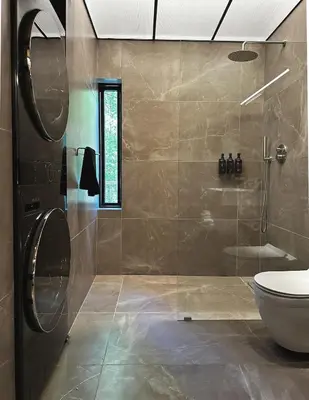 a bathroom with a shower and a toilet at Ranch in the Woods, a Peaceful Designer Retreat in Warwick