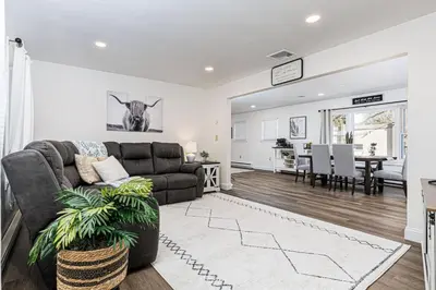 a living room with a couch and a table at Serenity Inn in Ronks