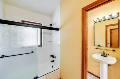 a bathroom with a sink and a shower at Golf, Fish and Ski Retreat with Game Room in Thompson in Thompson