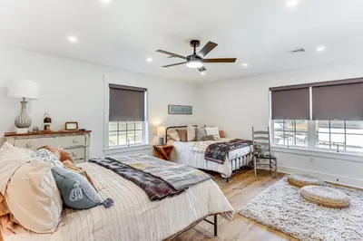 a bedroom with two beds and a ceiling fan at Walk to the Amish Village Spacious Ronks Getaway! in Ronks