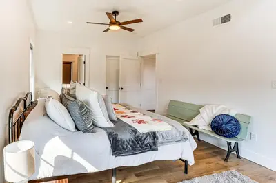 a bedroom with a bed and a ceiling fan at Walk to the Amish Village Spacious Ronks Getaway! in Ronks