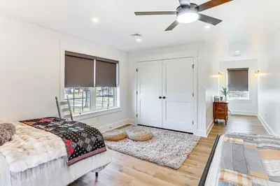 a bedroom with a bed and a ceiling fan at Walk to the Amish Village Spacious Ronks Getaway! in Ronks