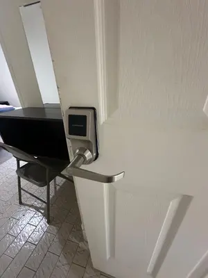an office door with a desk and a chair at AL Shami 408 in New York
