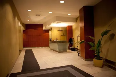 a large hallway with a sink in a building at Doorman! High Floor! Views! Elevator! Free Gym! in New York