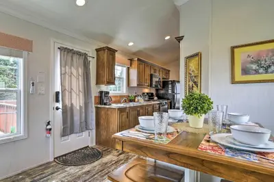 a kitchen with a table with dishes on it at 12 Bedroom Estate Experience 100 Acre Near Ski Area in Pleasant Mount