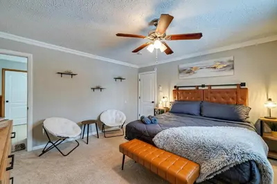 a bedroom with a bed and a ceiling fan at Pool Access! All-Season Family Home in Poconos in Crescent Lake