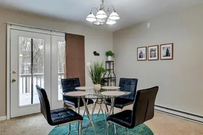 a dining room with a table and chairs at Pool Access! All-Season Family Home in Poconos in Crescent Lake