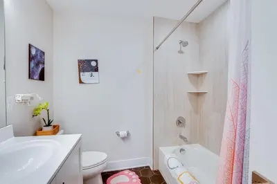 a bathroom with a sink and a toilet and a shower at 10 Mi to Morristown Stylish Home Near Trails! in Denville