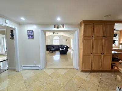 a large living room with a couch and a living room at Bridle Pool House in Lansdale