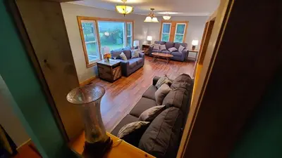 an aerial view of a living room with a couch at LARGE Open Floor Plan for Your Entertainment with a Short Walk to West Branch Delaware for Water fun and Fishing in Hancock