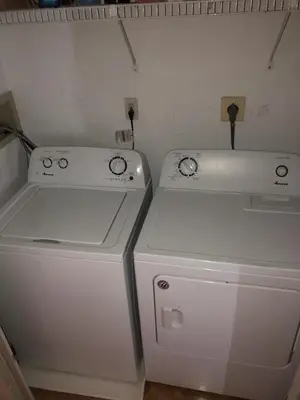 two white appliances sitting next to each other in a kitchen at Great Value - Oceanside Raised Ranch Location Is Perfect For Walking To Beach, Restaurants, Pizza, Ice Cream Or Coffee 13419 in Upper Greenwood Lake