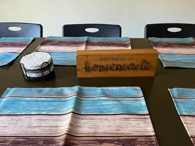 a table with a sign that reads happiness is homemade at Spacious and tranquil 5br house in charming East Stroudsburg w game room, pets allowed in East Stroudsburg