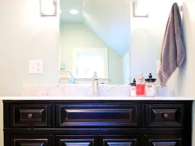 a bathroom with a sink and a large mirror at Stylish Cottage Loft Rental on a Farm in Lancaster County near Philadelphia, Pennsylvania in Christiana