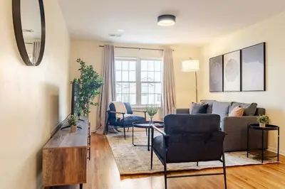 a living room with a couch and chairs and a table at 3BR Stay for Crews & Families in Elizabeth