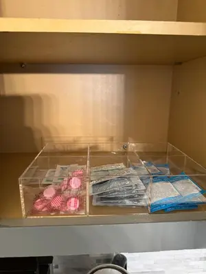 a glass shelf with different types of food on it at 3BR Stay for Crews & Families in Elizabeth