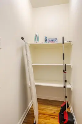 a mop in a room with a shelf at 3BR Stay for Crews & Families in Elizabeth