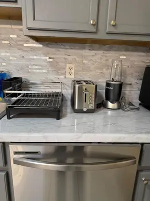 a kitchen counter with two appliances on a counter top at 3BR Stay for Crews & Families in Elizabeth