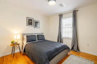 a bedroom with a bed and a window at 3BR Stay for Crews & Families in Elizabeth